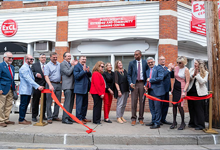 Dr Cardelle at ExCL center ribbon cutting