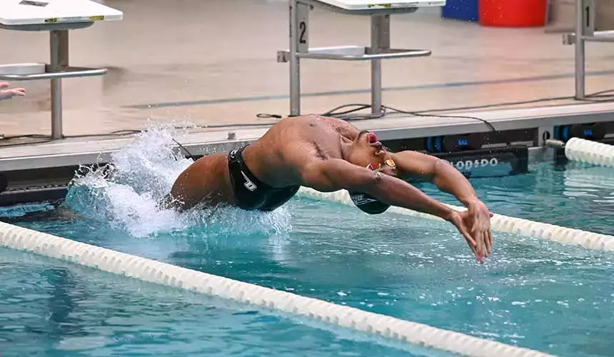 Delroy at swim meet in Chase gym